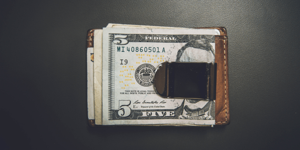 A money clip with US dollars in it.